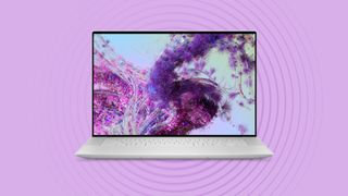 Dell XPS 14 on lilac background with radar style overlay
